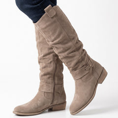 Zelda knee-high boots worn by model, studio shot