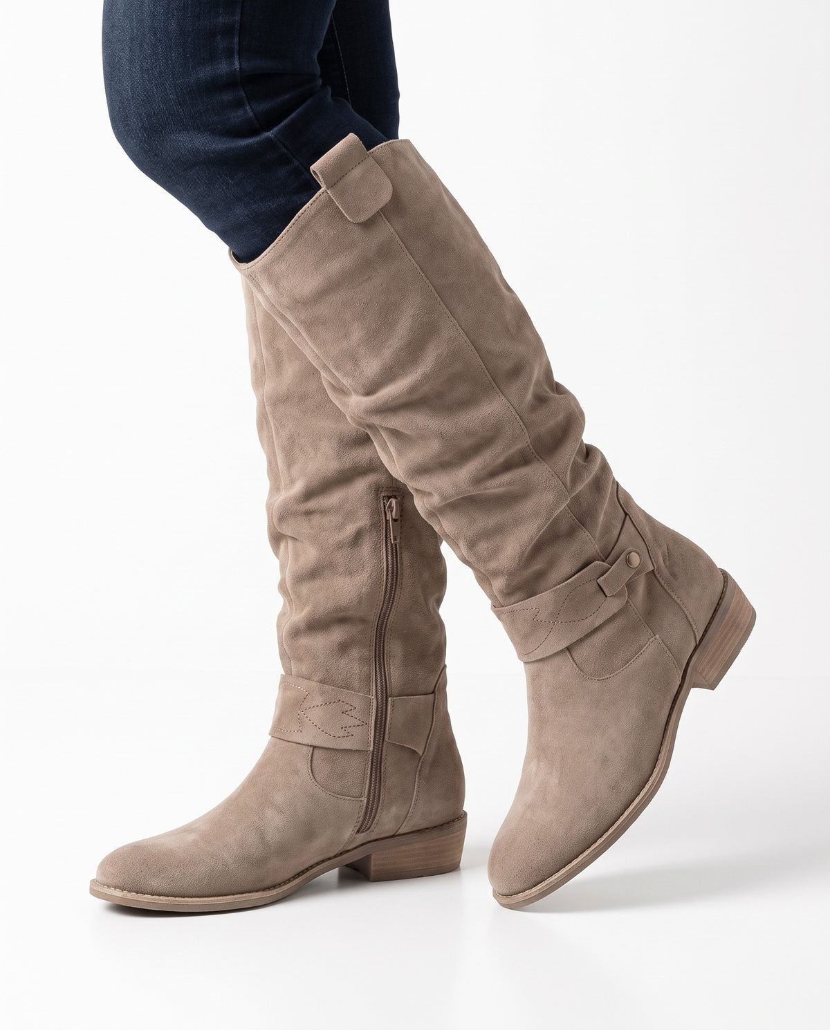 Zelda knee-high boots worn by model, studio shot