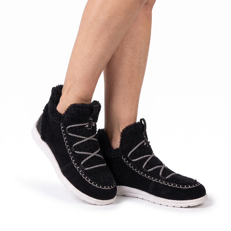 Paloma Women's Suede-Touch Plush-Lined Snow Boots worn by model