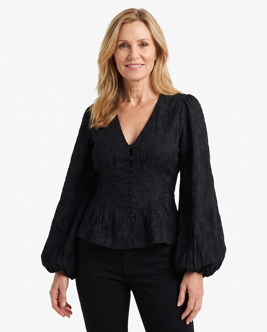 Astrid Women's Jacquard Lace Peplum Blouse worn by a model, studio white background