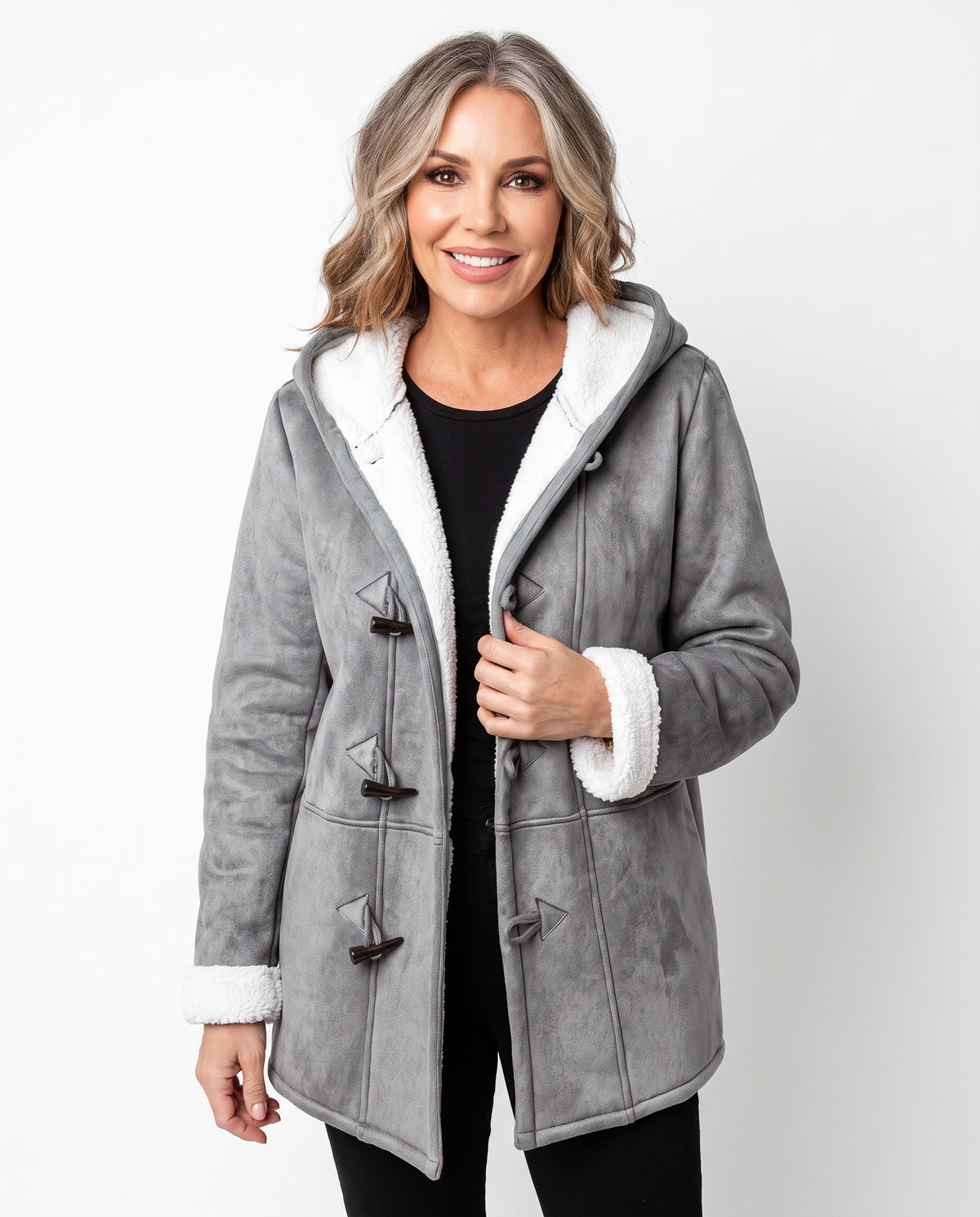 Martha Women's Hooded Fleece-Lined Longline Coat in gray, worn by a model, studio white background